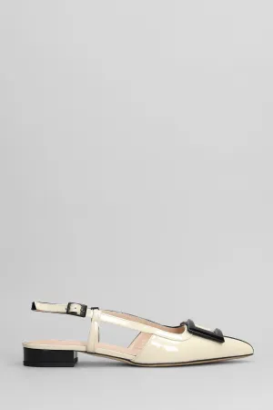 Ballet flats in black patent leather