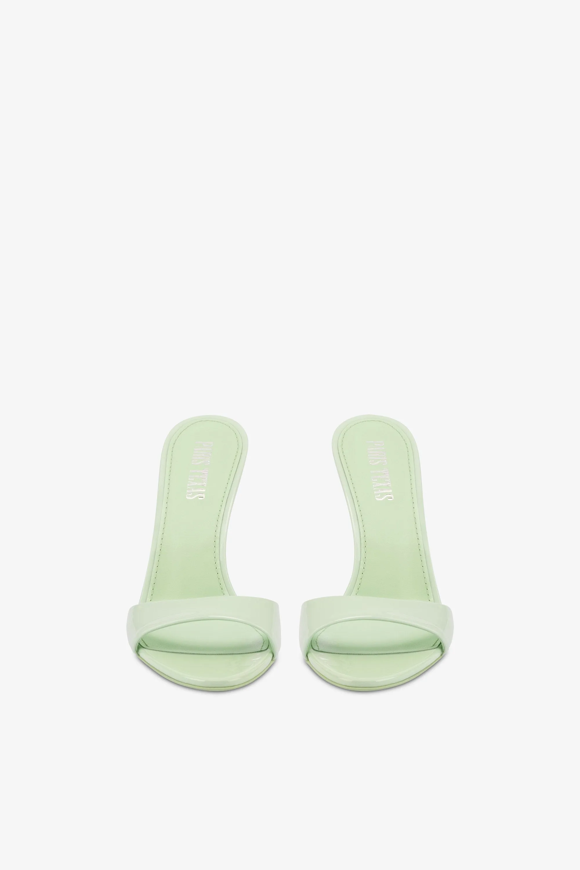 Mules in mint patent leather
