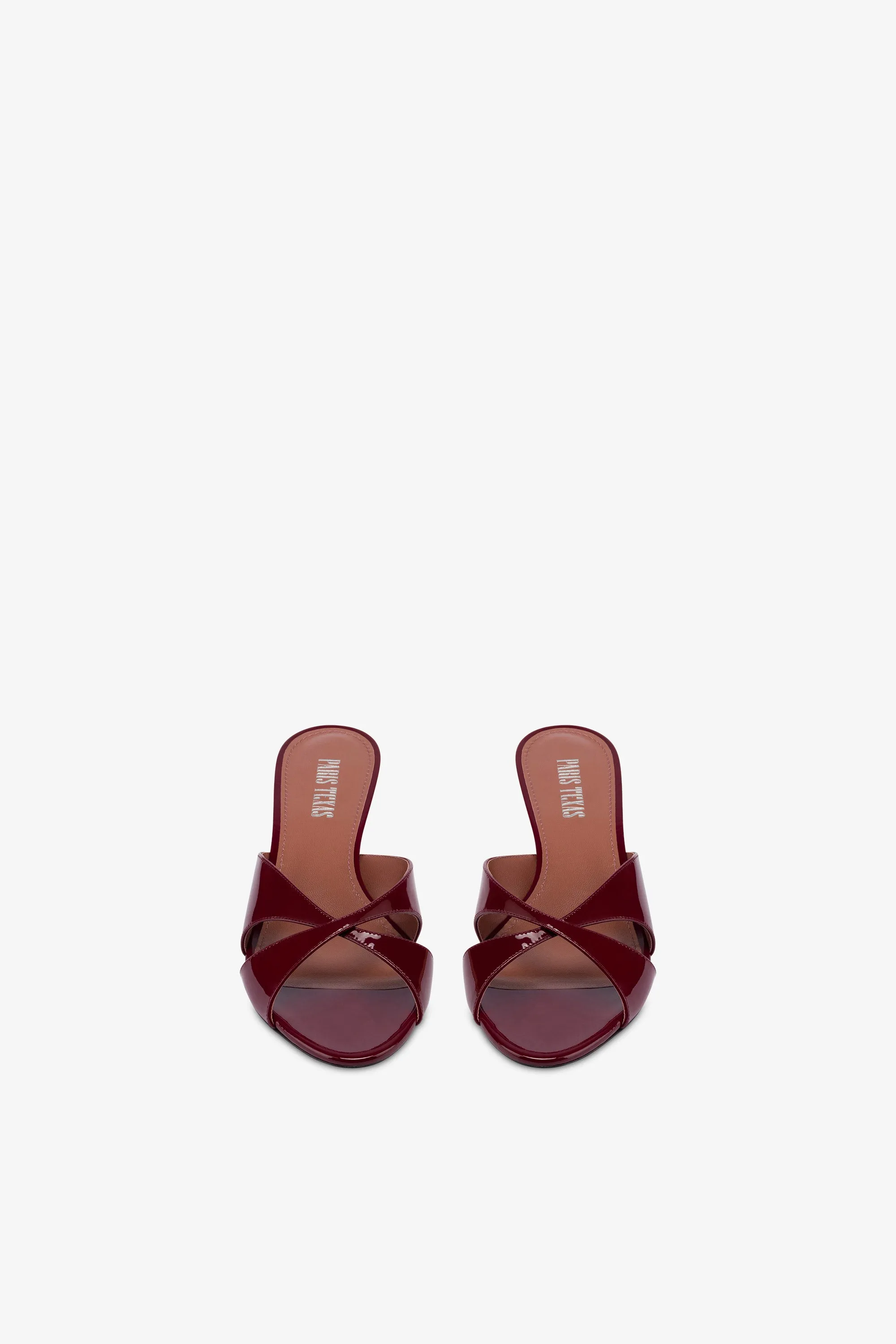 Mules in patent rouge noir leather