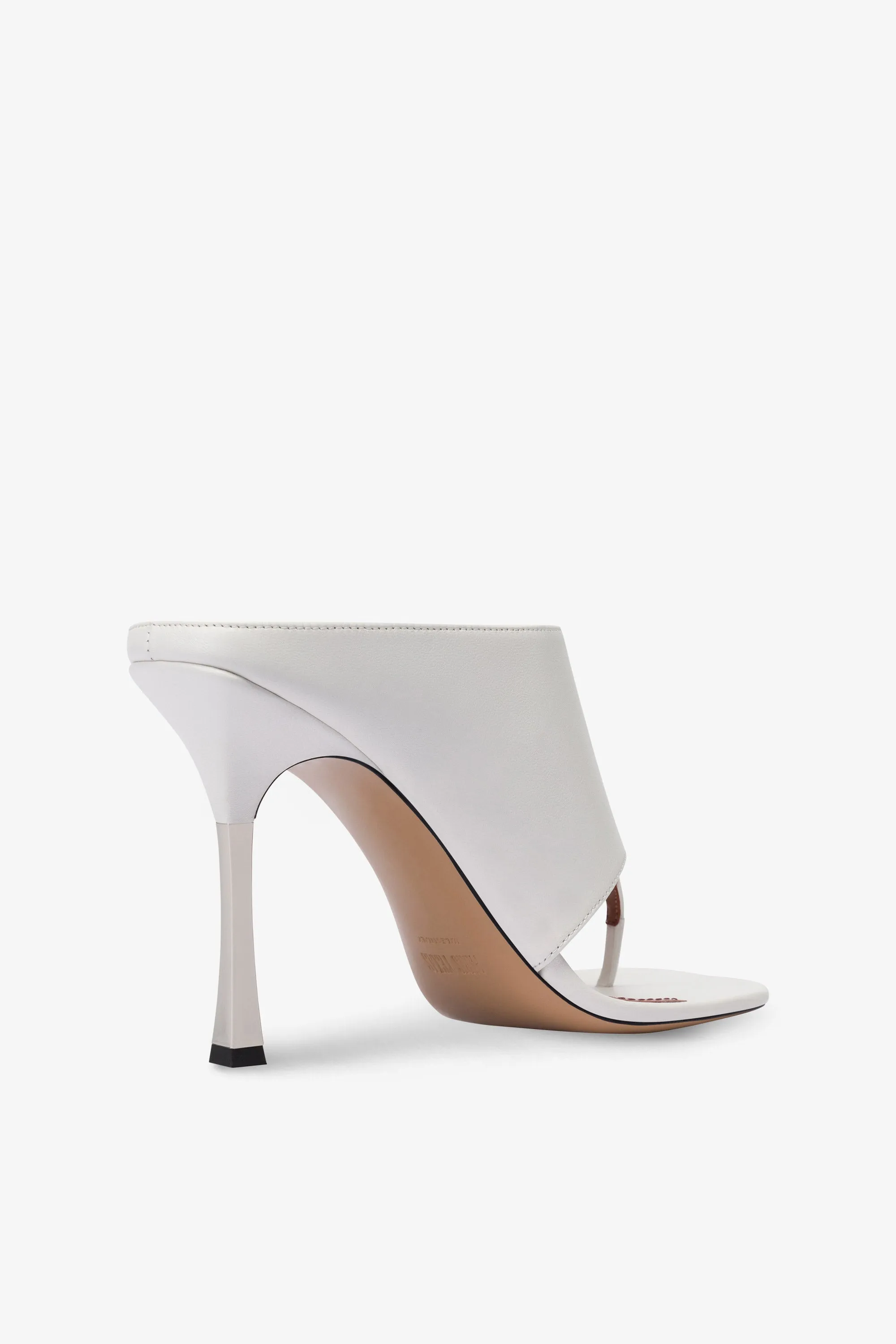 Mules in white leather