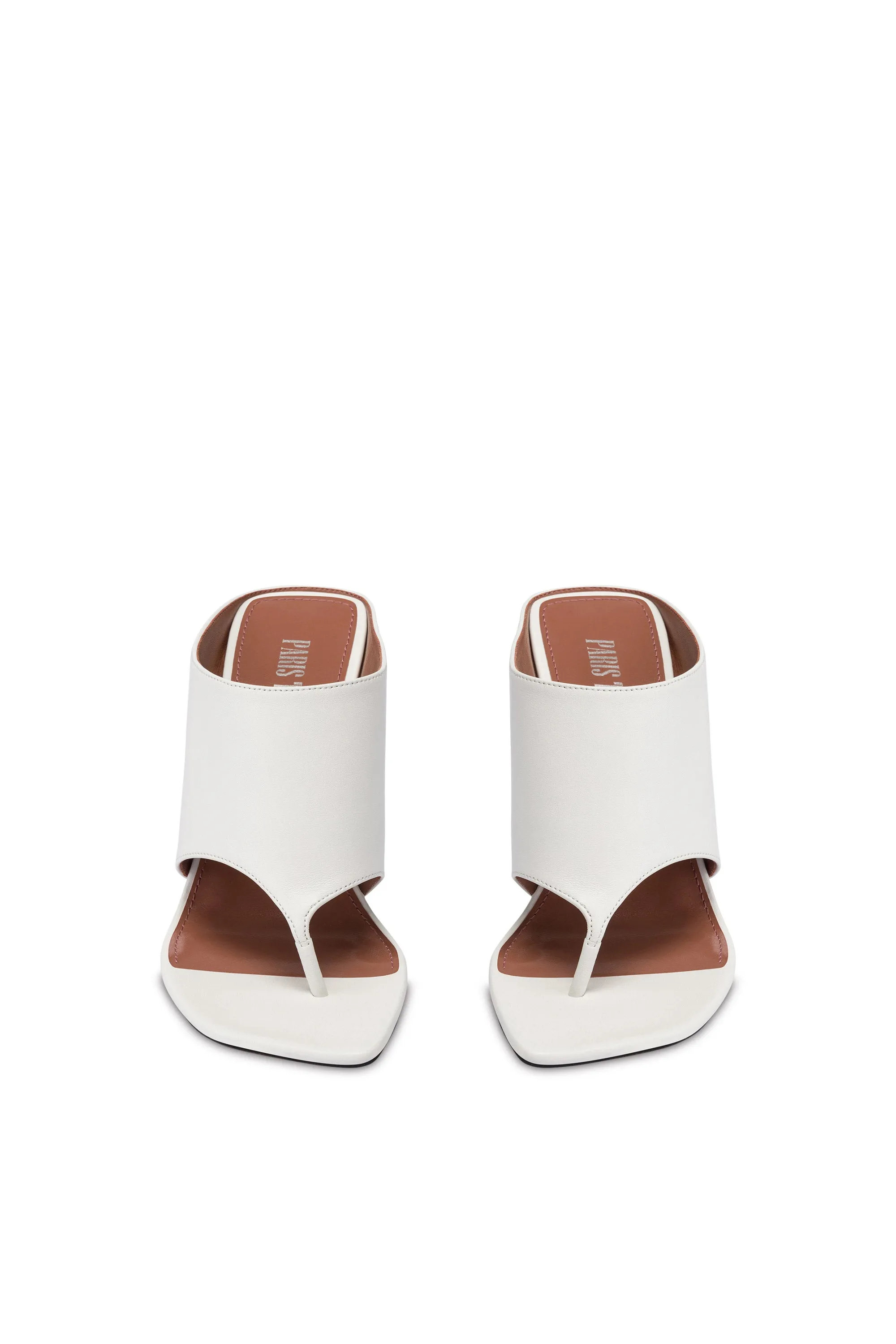 Mules in white leather